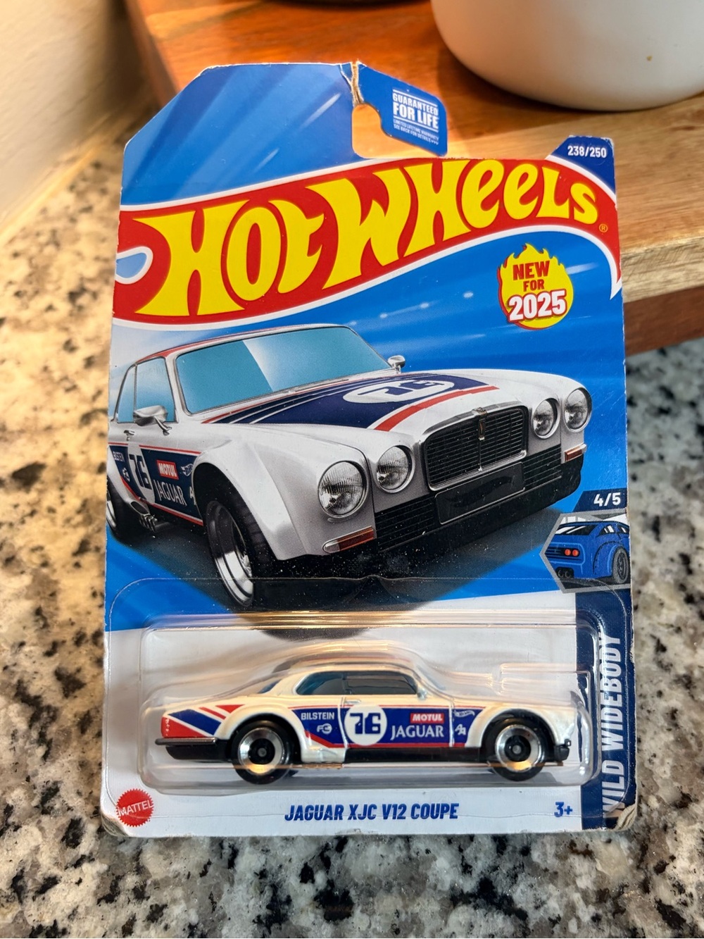 Hot Wheels Jaguar XJC V12 Coupe Toy Car - White with Blue & Red Racing Livery